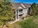 Charming two-story condo featuring double balconies and a well-maintained lawn at 4385 S Balsam St # 10-103, Littleton, CO 80123
