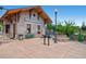 Historic stone building with seating and a landscaped area, adding charm to the neighborhood at 4385 S Balsam St # 10-103, Littleton, CO 80123