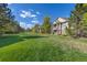 Beautifully landscaped lawn area in a condo community with well-maintained buildings at 4385 S Balsam St # 10-103, Littleton, CO 80123