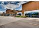 Inviting shopping center storefronts with colorful landscaping along a pedestrian-friendly street at 4385 S Balsam St # 10-103, Littleton, CO 80123