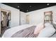 Bright bedroom with a walk-in closet and ensuite bathroom at 2900 Purcell St # F1, Brighton, CO 80601