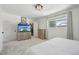 Bright bedroom featuring a large window and a closet with plenty of storage space at 12455 W Alameda Dr, Lakewood, CO 80228