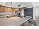 Modern kitchen features stainless steel appliances and a large island with stylish seating at 12455 W Alameda Dr, Lakewood, CO 80228