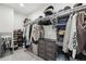 Well-organized walk-in closet with shelving, drawers, and ample space for clothes and shoes at 12455 W Alameda Dr, Lakewood, CO 80228