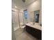 Modern bathroom with a walk-in shower at 15682 W Girard Ave, Morrison, CO 80465