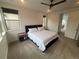 Bright bedroom with a queen-size bed and mountain views at 15682 W Girard Ave, Morrison, CO 80465