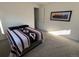 Well-lit bedroom with a queen-size bed and a window at 15682 W Girard Ave, Morrison, CO 80465