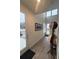 Bright and spacious entryway with wood-look floors at 15682 W Girard Ave, Morrison, CO 80465