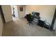 Home office with carpet and a desk setup at 15682 W Girard Ave, Morrison, CO 80465