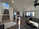Spacious living room with high ceilings and modern decor at 15682 W Girard Ave, Morrison, CO 80465