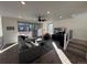 Spacious living room with hardwood floors and a sectional sofa at 15682 W Girard Ave, Morrison, CO 80465