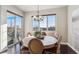 Elegant dining room with large windows and a chandelier at 5592 S Nevada St # 306, Littleton, CO 80120