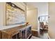 Bright entryway with hardwood floors and wooden console table at 5592 S Nevada St # 306, Littleton, CO 80120