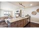 Modern kitchen island with granite countertop and sink at 5592 S Nevada St # 306, Littleton, CO 80120