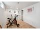 Bright workout area with exercise bike and mirrors, designed to enhance your fitness routine at 6267 Fenton St, Arvada, CO 80003