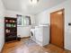Practical laundry room featuring a washer, dryer, and a window for natural light, enhancing functionality at 6267 Fenton St, Arvada, CO 80003