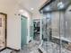 Spa-like bathroom with a large glass shower and gym access at 2635 Spruce Meadows Dr, Broomfield, CO 80023