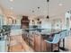 Modern kitchen featuring a large island and custom cabinetry at 2635 Spruce Meadows Dr, Broomfield, CO 80023