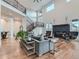 Spacious living room featuring high ceilings, a fireplace, and hardwood floors at 2635 Spruce Meadows Dr, Broomfield, CO 80023