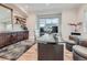 Home office with built-in cabinetry and hardwood floors at 2635 Spruce Meadows Dr, Broomfield, CO 80023