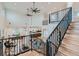 Open staircase overlooking the living room and kitchen at 2635 Spruce Meadows Dr, Broomfield, CO 80023