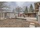 Backyard featuring a garage, patio and shed at 1201 Moline St, Aurora, CO 80010