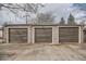 View of the three-car garage at 1201 Moline St, Aurora, CO 80010