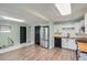 Modern kitchen with stainless steel appliances, wooden countertops, and light green walls at 1201 Moline St, Aurora, CO 80010