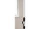 Close up view of a classic door handle and decorated door design at 8737 Santa Fe Dr, Thornton, CO 80260