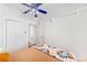 Bright bedroom with closet and ceiling fan at 178 W Cedar Ave, Denver, CO 80223