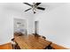 Dining room with hardwood floors and a view into the living room at 178 W Cedar Ave, Denver, CO 80223