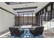 Covered patio with comfortable seating and modern design at 3069 S Detroit Way, Denver, CO 80210