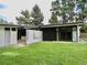 Updated mid-century modern home with a spacious backyard and privacy wall at 3069 S Detroit Way, Denver, CO 80210