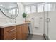 Contemporary bathroom with a frameless glass shower and stylish vanity at 3069 S Detroit Way, Denver, CO 80210