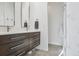 Modern bathroom with double vanity and walk-in shower at 3069 S Detroit Way, Denver, CO 80210