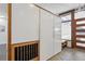 Modern entryway with built-in storage and dog kennel at 3069 S Detroit Way, Denver, CO 80210