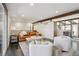 Bright living room with leather sofa and access to kitchen at 3069 S Detroit Way, Denver, CO 80210