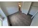 Bright bedroom offers natural light, carpet flooring, and a closet for ample storage at 4296 S Halifax Way, Aurora, CO 80013