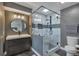 Bathroom with a large glass shower and modern fixtures at 2221 S Dearborn St, Aurora, CO 80014