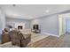 Living room with fireplace and hardwood floors at 2221 S Dearborn St, Aurora, CO 80014