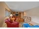 Well-lit basement living room with a warm and inviting atmosphere and comfortable furniture at 22124 E Euclid Dr, Aurora, CO 80016