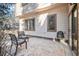 Small patio with two chairs, offering a private outdoor space at 6386 E Tufts Ave, Englewood, CO 80111