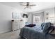 Main bedroom with a ceiling fan and dresser at 2058 Spencer Ave, Castle Rock, CO 80104