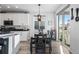 Kitchen dining area with table and chairs, access to a deck or patio at 2058 Spencer Ave, Castle Rock, CO 80104