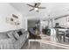 Spacious living room with open floor plan and kitchen view at 2058 Spencer Ave, Castle Rock, CO 80104