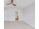 Bright bedroom with ensuite bathroom, carpet and ceiling fan at 290 Poplar St # A, Denver, CO 80220