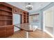 Bright office featuring built in shelving, a desk, and a window at 290 Poplar St # A, Denver, CO 80220