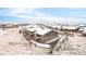Aerial view of a neighborhood with snowy yards, homes, and cul-de-sac at 22364 E Bailey Pl, Aurora, CO 80016