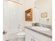 Well-lit bathroom featuring a vanity with sink and a shower-tub combination at 22364 E Bailey Pl, Aurora, CO 80016