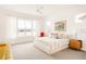 Bright bedroom with a large window, neutral decor, and ample space at 22364 E Bailey Pl, Aurora, CO 80016